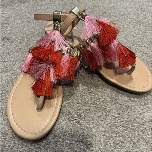 Fun fringe and gold sandals
